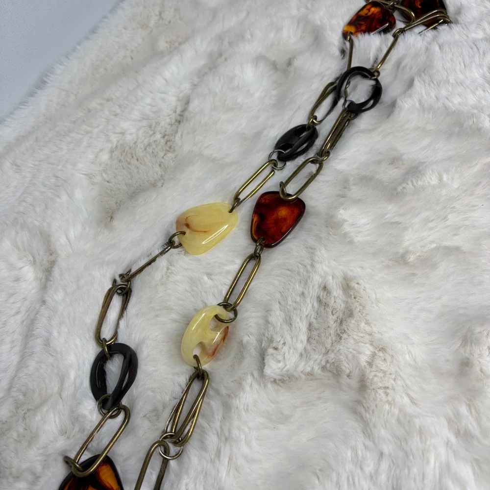 Fossil Women Brass Tone Chain Belt Faux Amber Resin Guitar Pick Charms 43 Inch